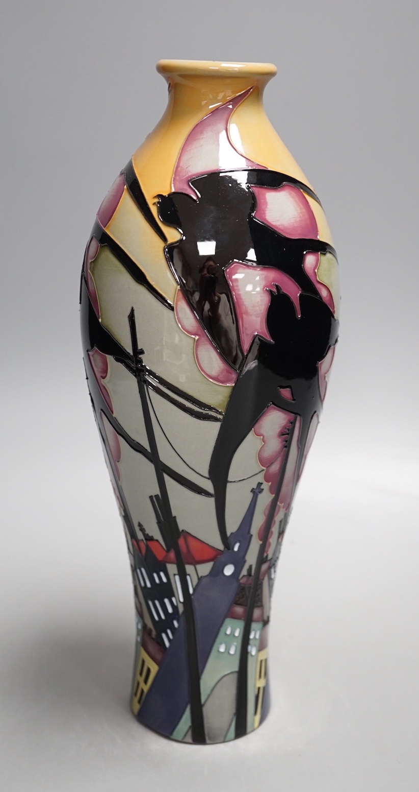 A rare Moorcroft 'swallows in smoke' vase by Kerry Goodwin, 2012, 31cms high.